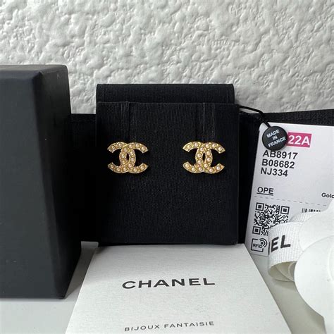 chanel cc logo stud earrings